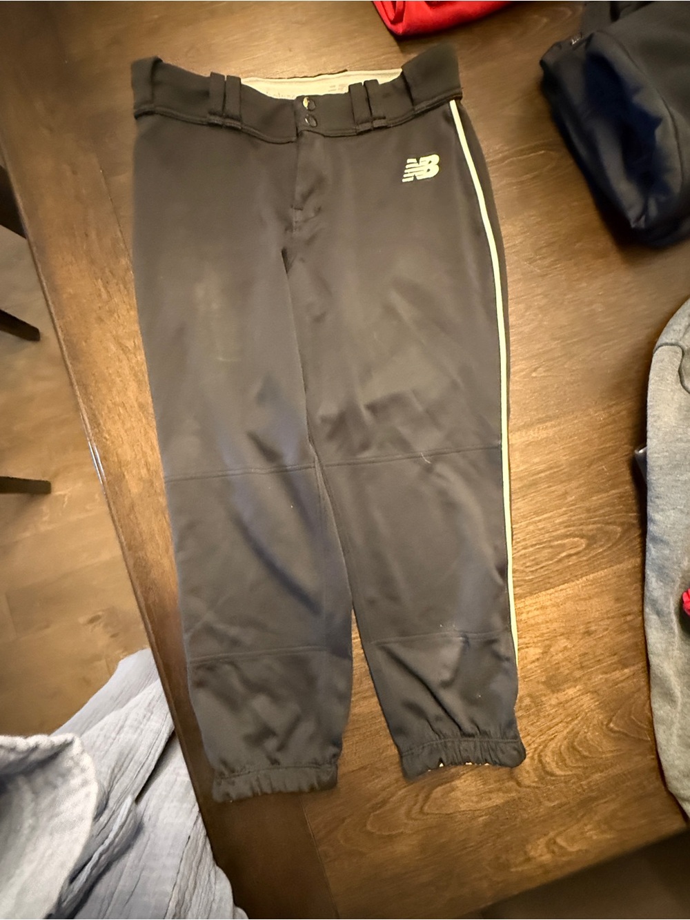 New Balance women’s ' Black softball Pants with Side Stripe